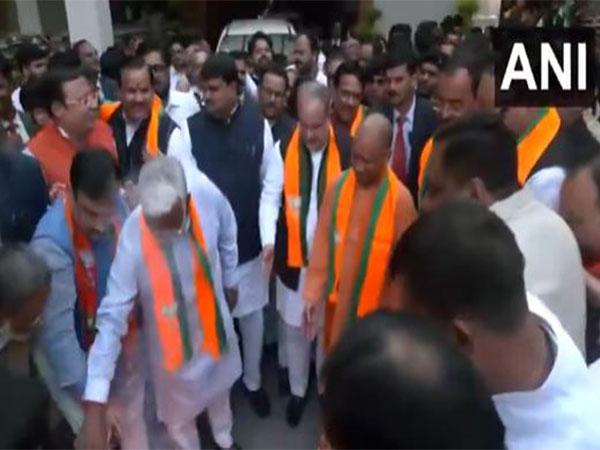 up-cm-yogi-adityanath-celebrates-outside-bjp-office-after-assembly-bypoll-results